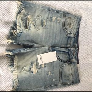 Carly Jean High wasted Jean shorts.